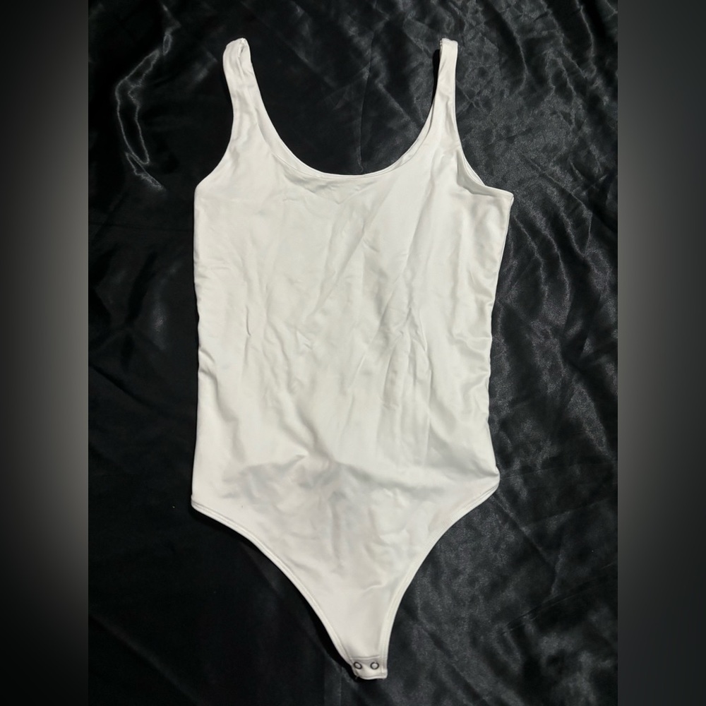 White thong bodysuit